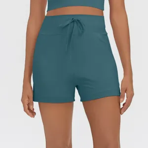 High-waisted athletic shorts with drawstring and side pockets for women fitness yoga gym wear.