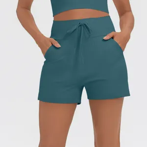 Women high waist athletic shorts with drawstring and side pockets for gym and yoga fitness.