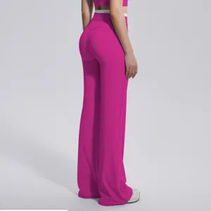 Pantalon de yoga evase taille haute femme rose vif avec contraste detail vue