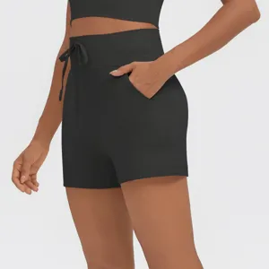 High-waisted athletic shorts with drawstring and side pockets for women fitness and yoga.