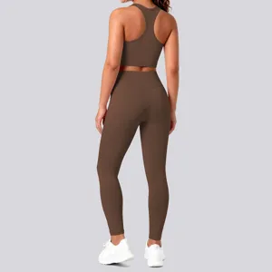 Brown two-piece yoga set, backless sports bra and high waist fitness leggings for women.