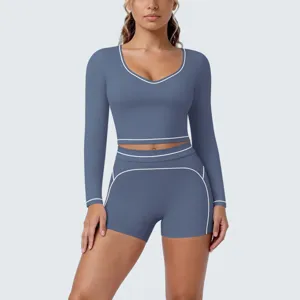 Contrast low neck long sleeve top and shorts yoga set for fitness running workout.