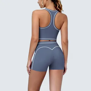 Back view of a seamless ribbed yoga set, sports bra and workout shorts with piping.