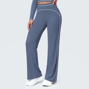 Close-up detail of high-waist contrast piping wide-leg yoga active pants in dark blue.