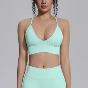 Seamless mint green sports bra detail, high elasticity breathable fitness yoga wear top for women.
