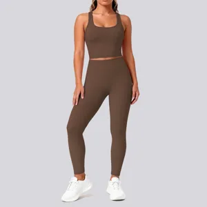 Solid color seamless yoga set, crop top and high waist leggings for fitness and running.