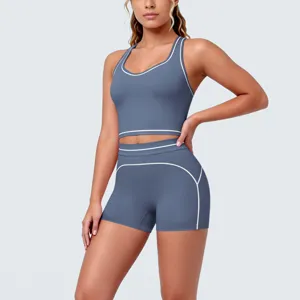 Blue contrast piping sports bra and active shorts set detail view for fitness training.