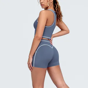 Contrast piping brushed racerback sports bra and tight yoga shorts set for fitness.