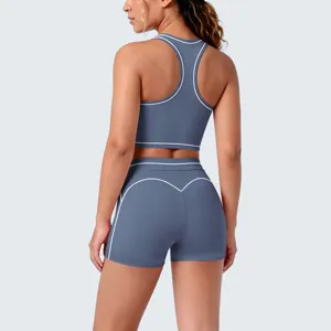 Back view detail of the blue contrast piping racerback yoga set featuring a sports bra and shorts.