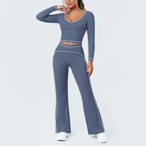 Blau-graues Kontrast Langarm Crop Top und Schlag Yoga Hose Sportbekleidung Set.