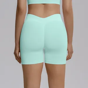 Back detail of mint green seamless knit V-waist high-waist fitness gym yoga shorts.
