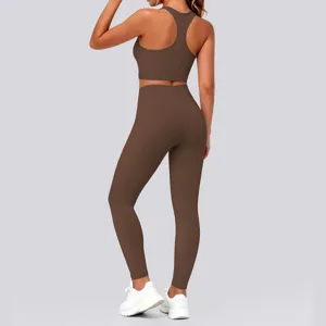 Women solid color racerback sports bra and high waist yoga leggings two piece athletic set.
