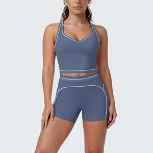 Contrast piping activewear set, racerback yoga crop top and matching shorts for fitness.