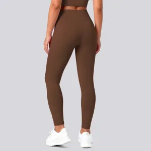 Back view detail of brown high-waisted tight fitness yoga leggings, comfortable fabric.