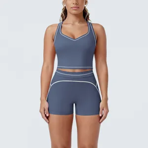 Women athletic yoga set two-piece workout running fitness racerback sports bra shorts.