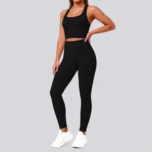 Detailed shot of a solid black seamless sports bra and high-waisted yoga leggings set.