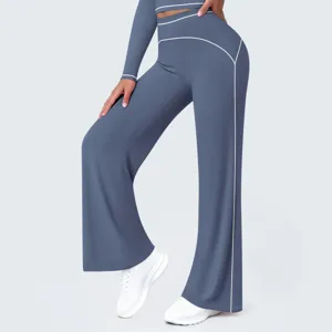 High waist wide leg athletic pants detail, blue-grey activewear with stylish contrast piping.