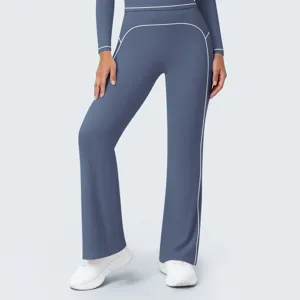 High-waisted yoga pants with contrast white piping detail, stretchy athletic fitness leggings.