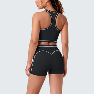 Contrast color racerback sports bra and shorts yoga set, back view detail showing fit.