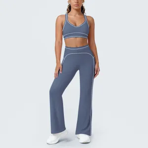 Completo sportivo donna reggiseno pantaloni a zampa yoga running fitness 2 pezzi blu