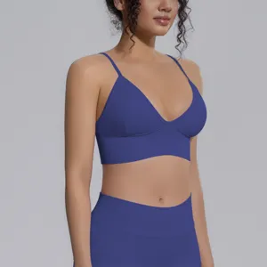 Seamless blue sports bra and yoga pants set detail, breathable and high elastic workout wear.