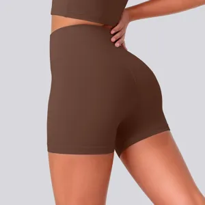High waist yoga shorts detail view, featuring stretchy breathable fabric for active running fitness.