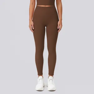 Detail view of high-waisted brown yoga leggings, perfect for running, fitness and workouts.