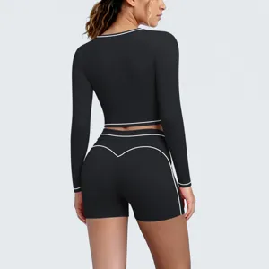 Black contrast piping long sleeve crop top and shorts yoga set for women fitness running gym.