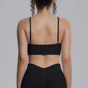 Black seamless sports bra and leggings set, back view detail for fitness running yoga workout.
