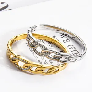 Interlocking rhinestone metal bracelets, elegant dual-tone silver and gold fashion jewelry.