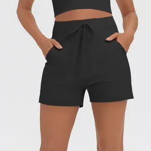Women's high waist athletic fitness shorts with pockets and drawstring casual sportswear.