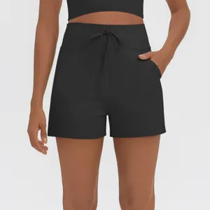 High-waisted athletic shorts with drawstring and side pockets for gym yoga fitness.