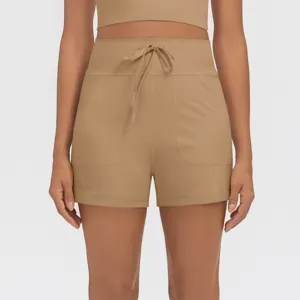Women's high waist drawstring athletic shorts with side pockets for fitness yoga gym running.