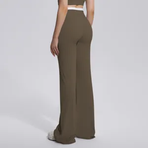 Pantalon de yoga évasé taille haute femme, legging de sport avec ceinture contrastée.