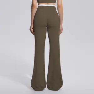 Pantalon de yoga évasé taille haute pour femmes, vêtement de sport à ceinture contrastée.