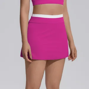 Jupe de tennis athlétique côtelée à taille haute contrastée short de sport rose élégant