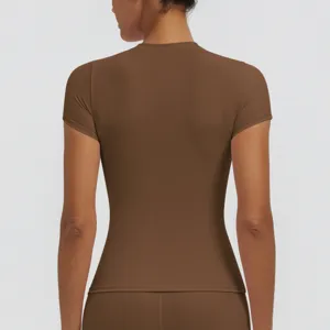 Back view detail of women solid brown quick drying short sleeve fitness yoga sports top.
