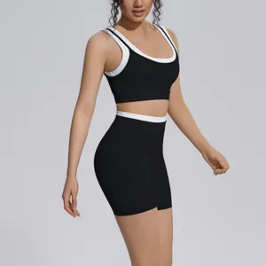 Detailed view of the black and white contrast sportswear set showing premium fabric and fit.