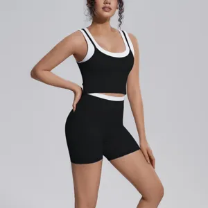 Black white contrast sports tank top and shorts yoga set detail for fitness running.