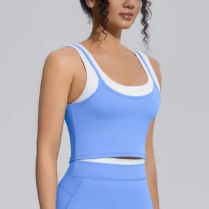 Ensemble soutien-gorge de sport deux pièces, haut de yoga côtelé bleu et blanc pour fitness.