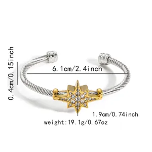 Nahaufnahme Detail Edelstahl Draht Manschette Armband mit glänzendem Kristallstern.