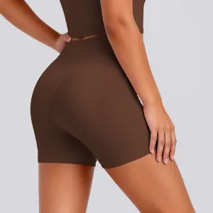 High-waisted tight yoga shorts detail shot showing seamless back contour and breathable fabric.