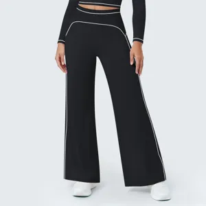 Detailed view of women high waist black wide leg pants with white piping trim casual activewear.