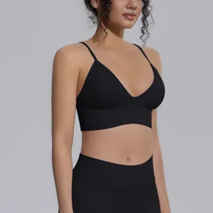 Close-up view of a black seamless sports bra detail, breathable fabric and comfortable fit.