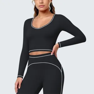 Dames contrastbies atletische lange mouw crop top en bijpassende leggings fitness set