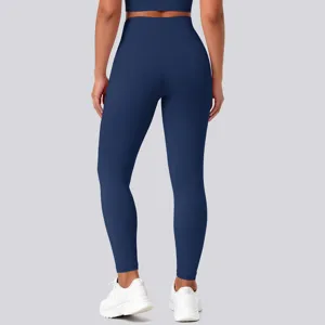 Detailed rear view of high-waisted stretch yoga leggings in solid navy blue color.