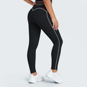 Leggings deportivos de yoga negros de cintura alta con ribetes y realce de glúteos.