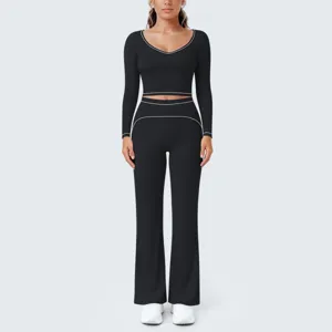 Schwarzes langarm Crop Top Schlag Yoga Hosen Set mit weissen Paspeln fuer Damen Fitness Sport.