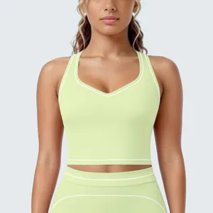 Dames lichtgroene sportbh en yogabroek set, ademende racerback fitness sportkleding.