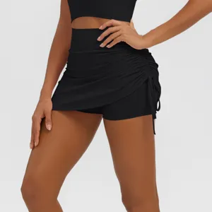 Black high waist ruched fake two piece yoga skirt activewear detail view showcasing breathable fit.